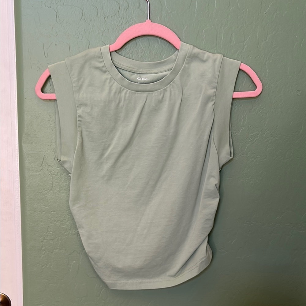 Sleeveless light green muscle tank